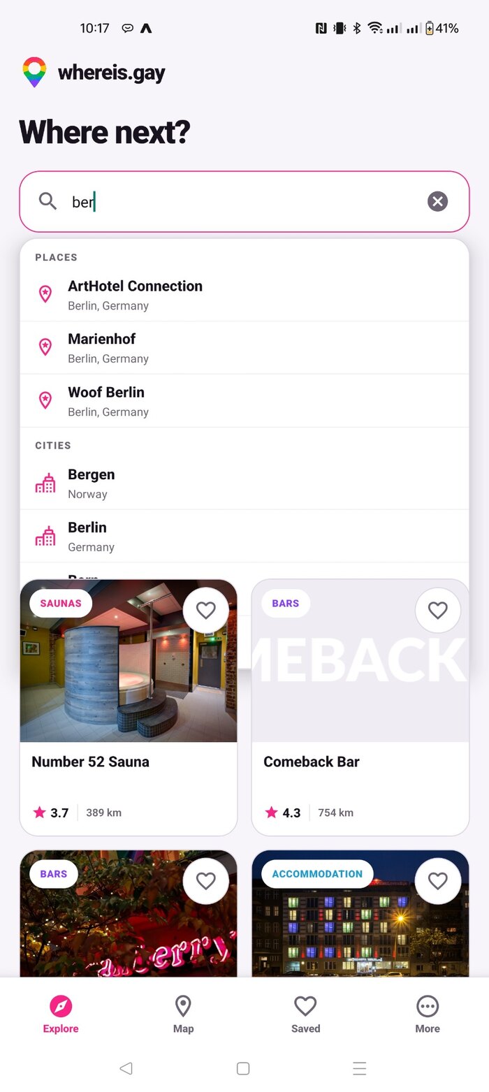 Screenshot of the WhereIs.Gay Explore screen with venue cards